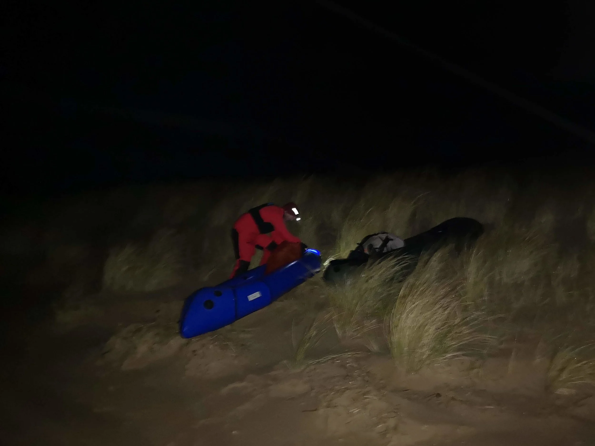 Inflating packrafts at 5am on a moonless night. Decent dry suits meant that sub-zero temperatures and driving rain wasn’t a problem.