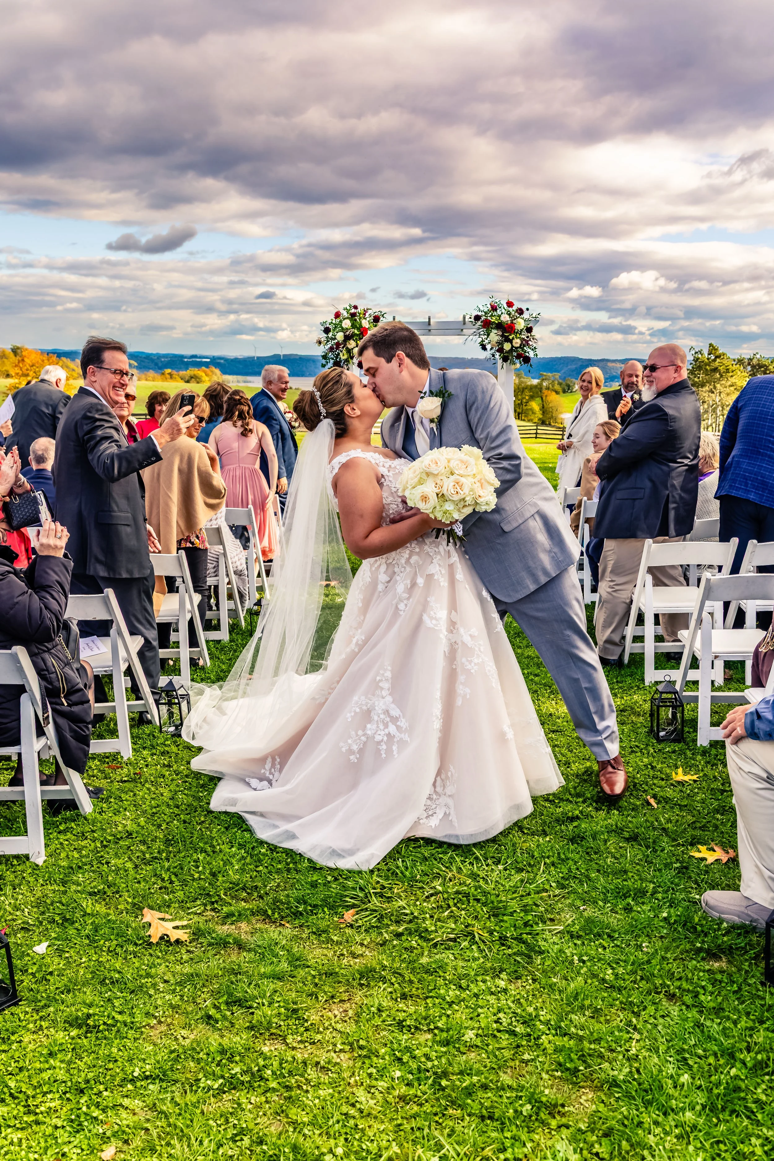 young couple groom dips bride kissing after wedding vows, wedding, Lauxmont Farms, Japanese Garden, Wrightsville Pennsylvania