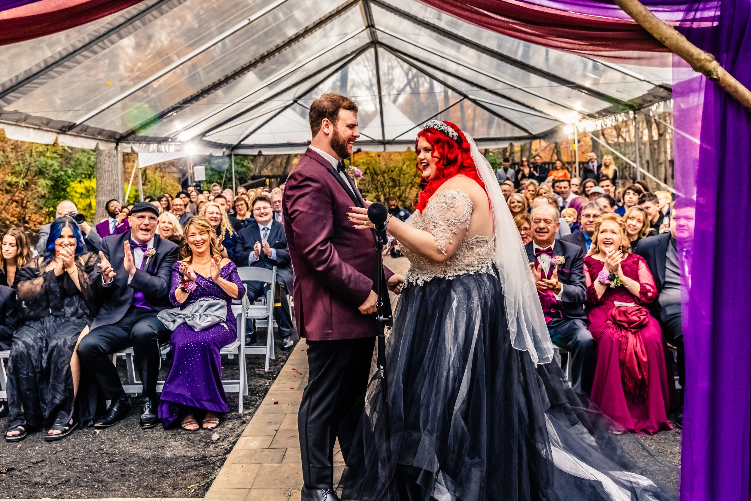 couple facing each other after wedding vows, wedding guests in the background, Woodlands, Wilkes Barre, Pennsylvania
