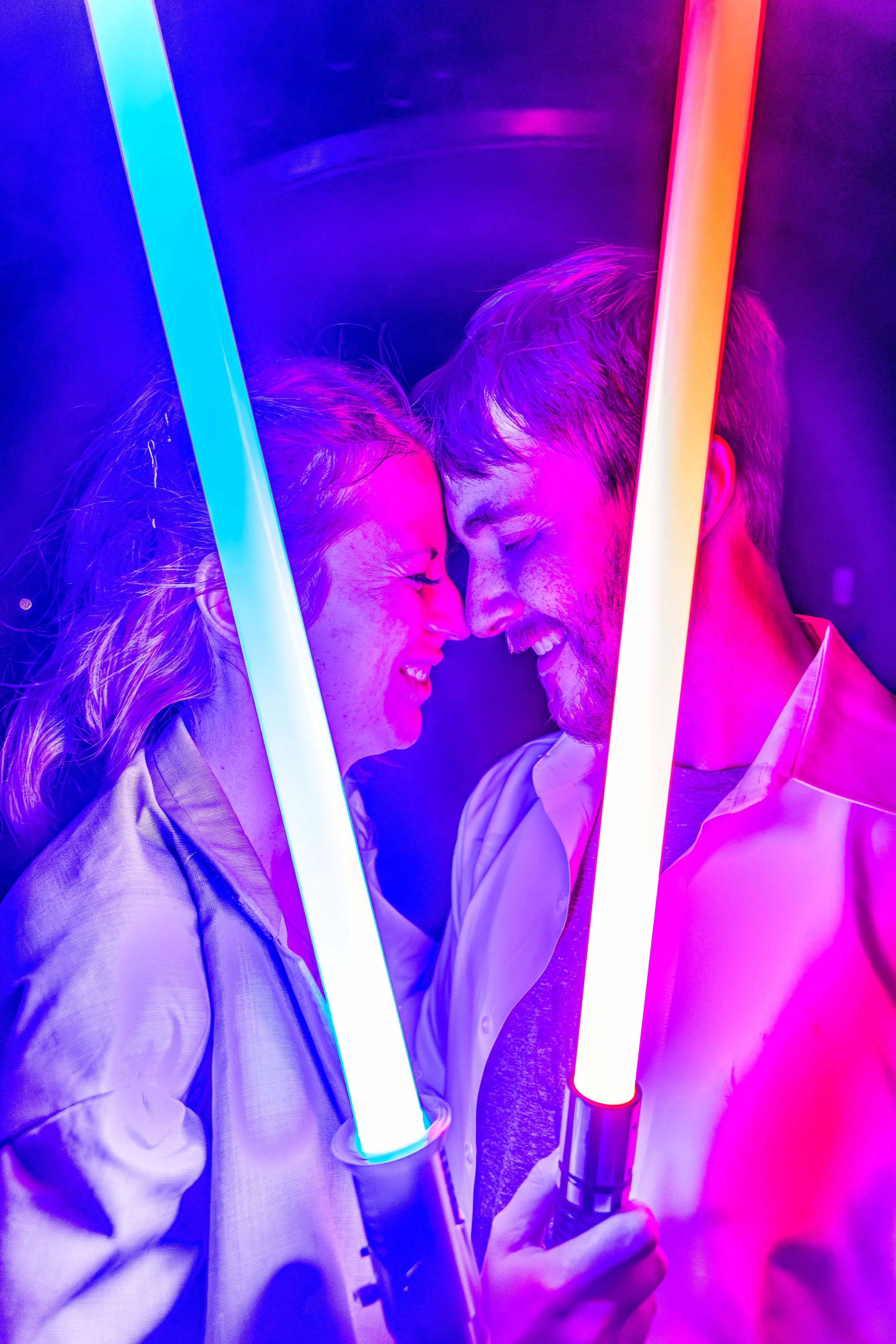 young couple posing with light sabers, wedding, Fero Gardens, Pennsylvania
