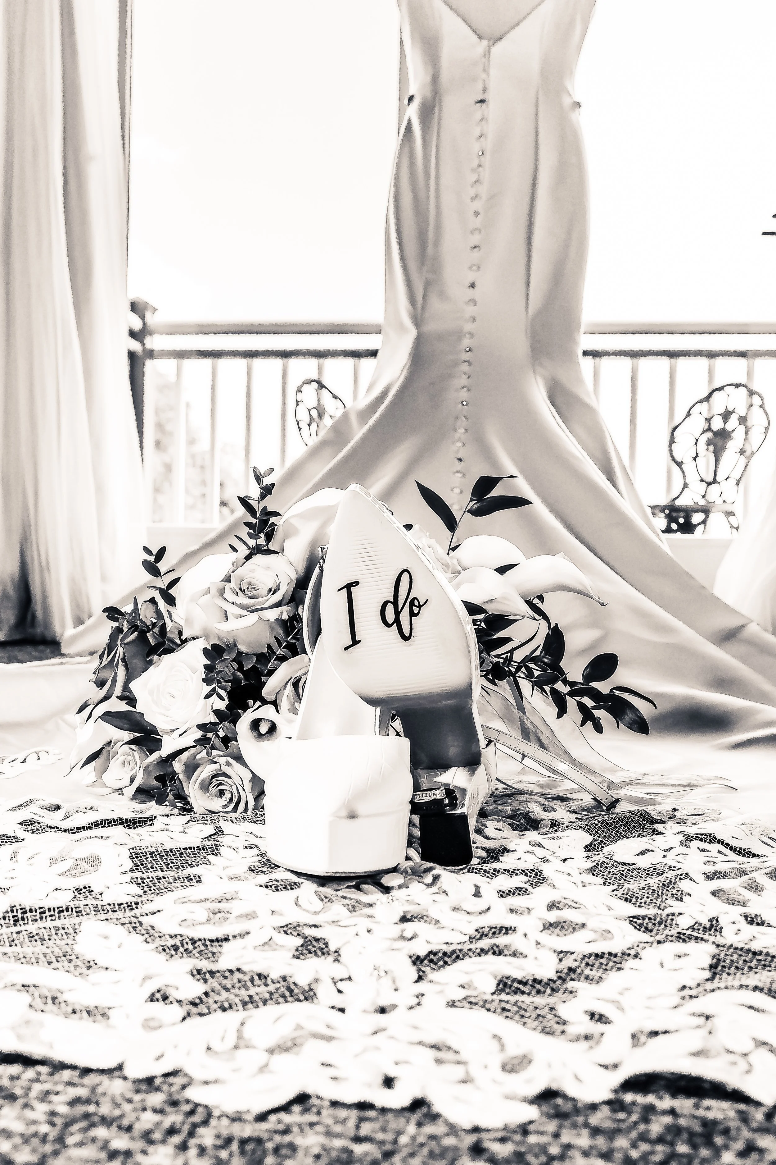black and white picture of wedding dress and shoes at Woodstone, Pennsylvania