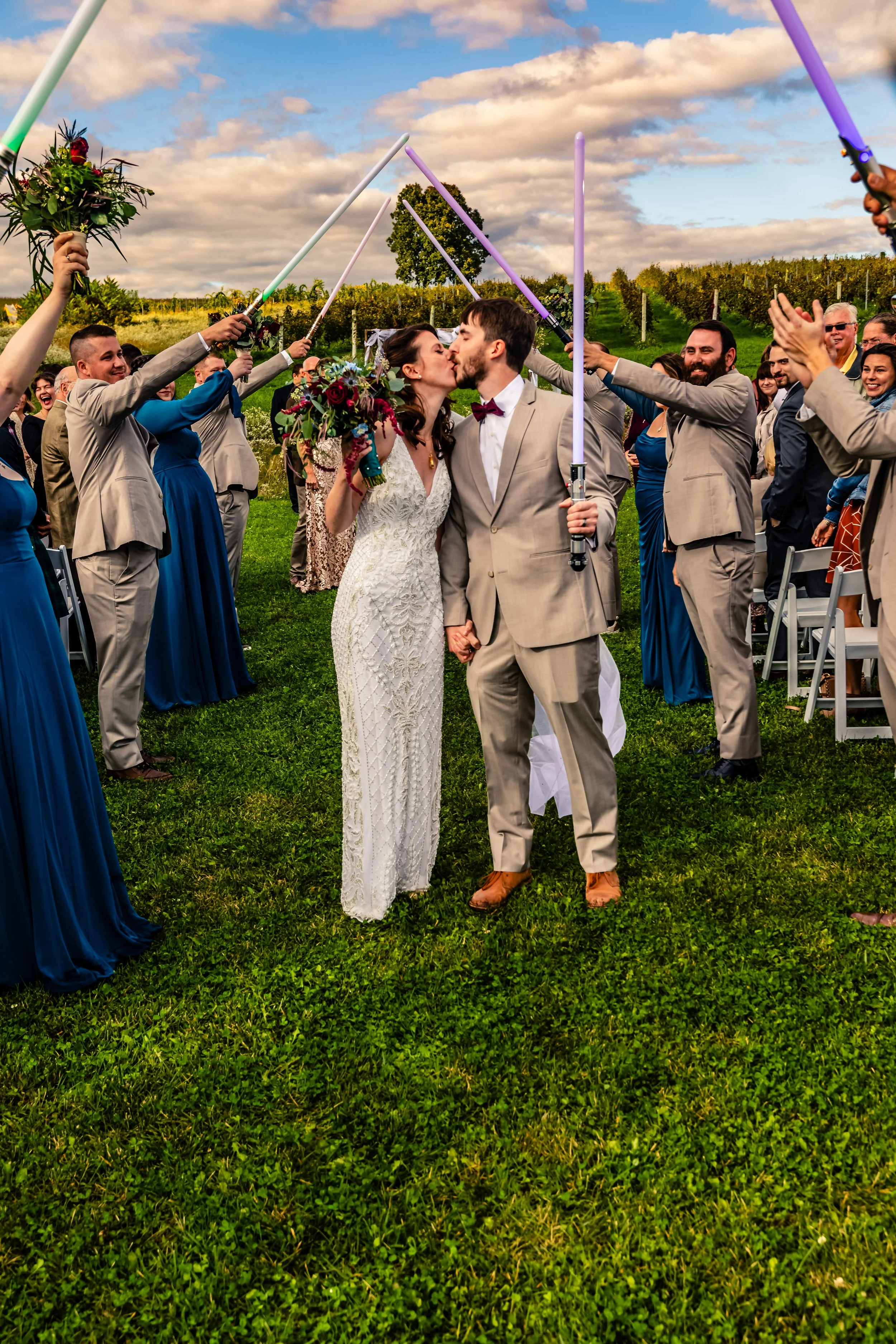 young couple posing with light sabers after wedding vows, wedding, Fero Gardens, Pennsylvania
