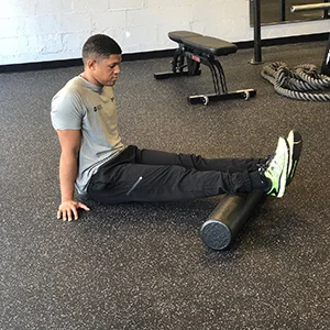 Slowly roll to the bottom of the calves, avoiding the Achilles tendon.