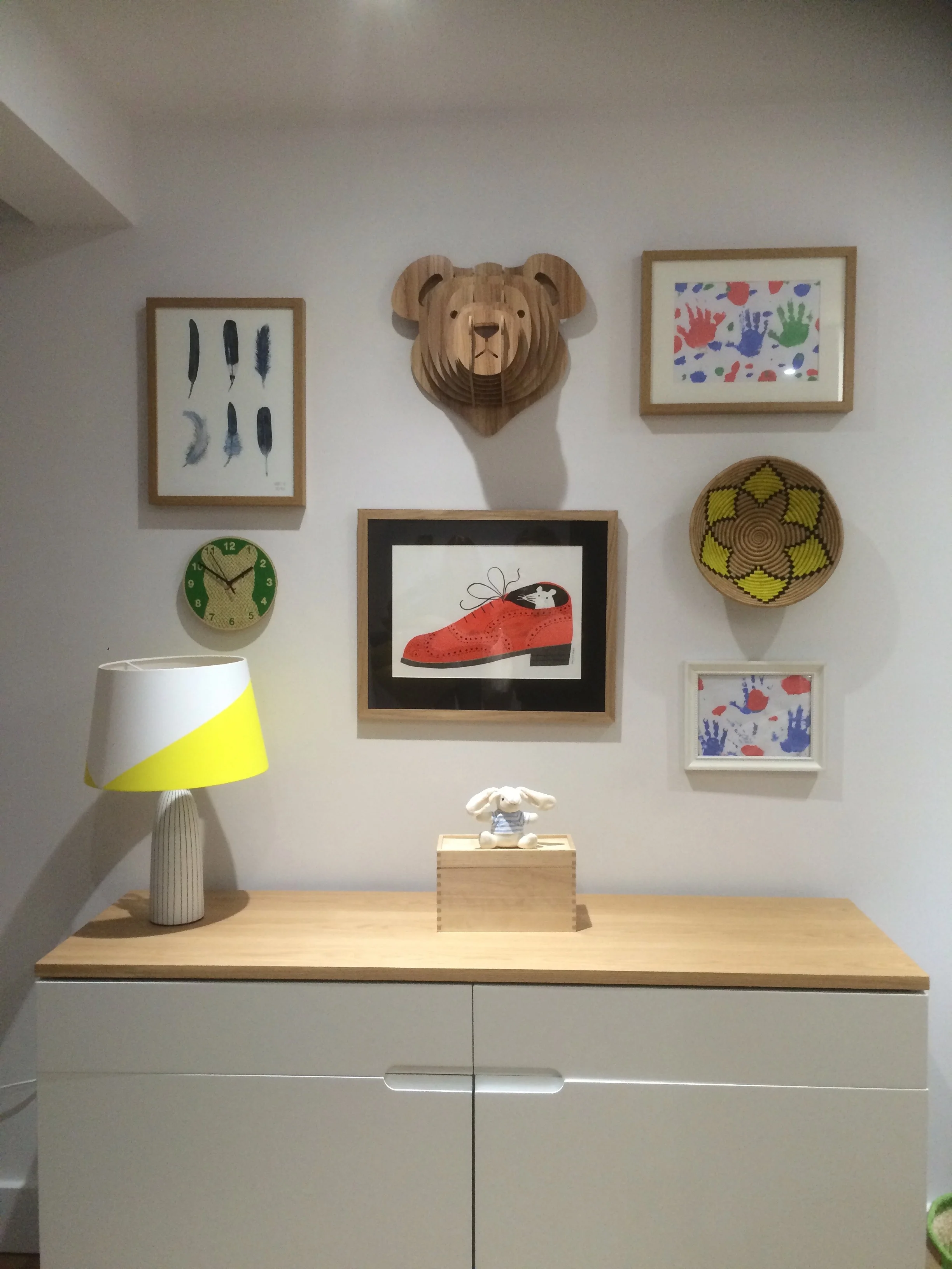 The finished playroom gallery wall