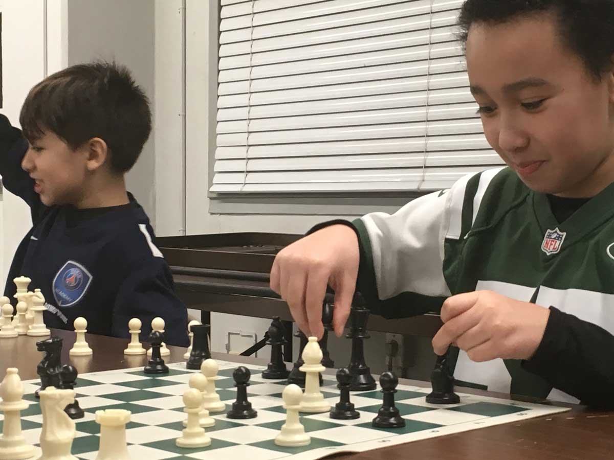 Local Chess Hero Encourages Youth to Make A Move