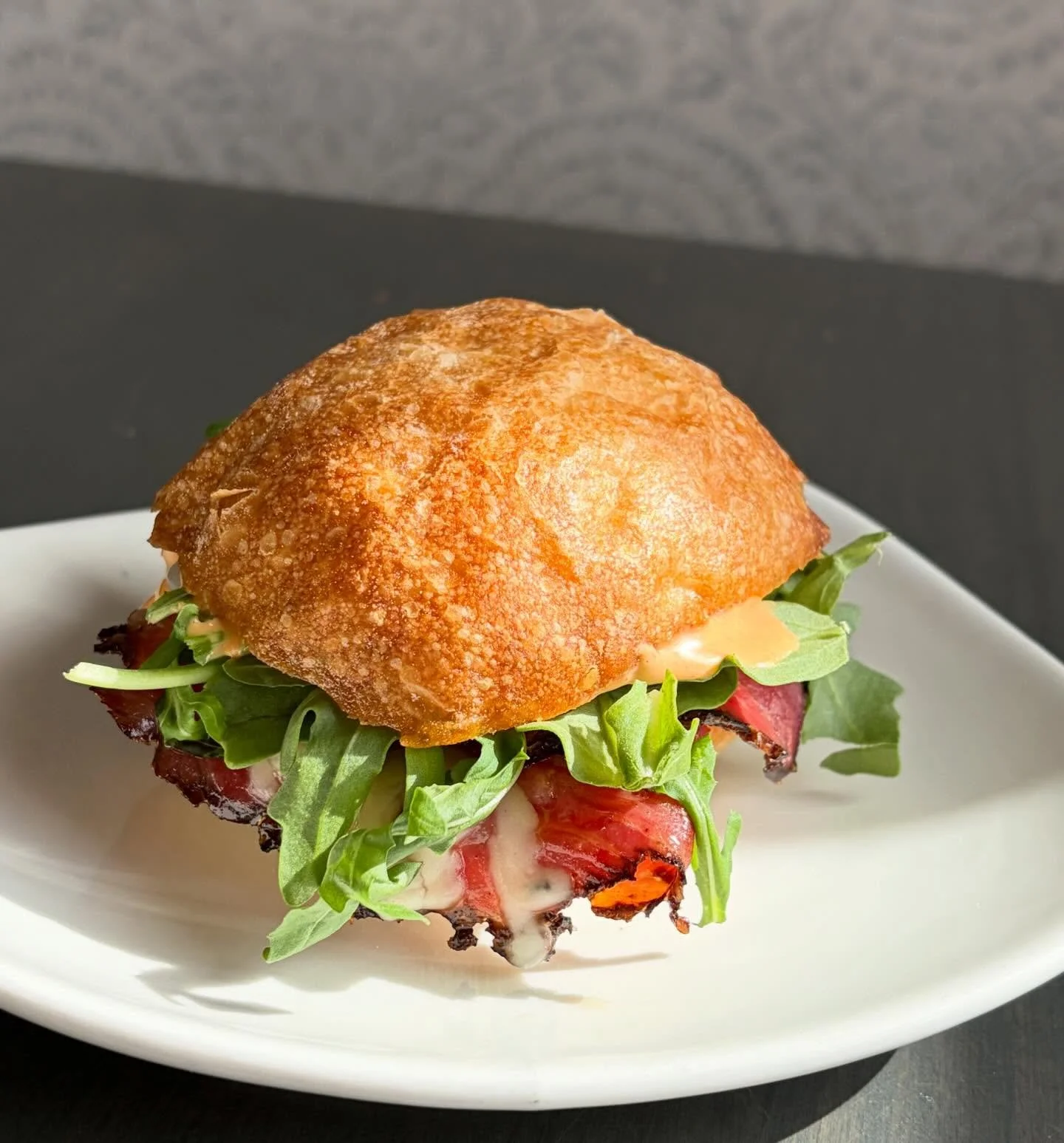 MARCH MONTHLY SPECIAL 
Pastrami Slider Sammy
Pastrami, Swiss, arugula and rise spicy special sauce!