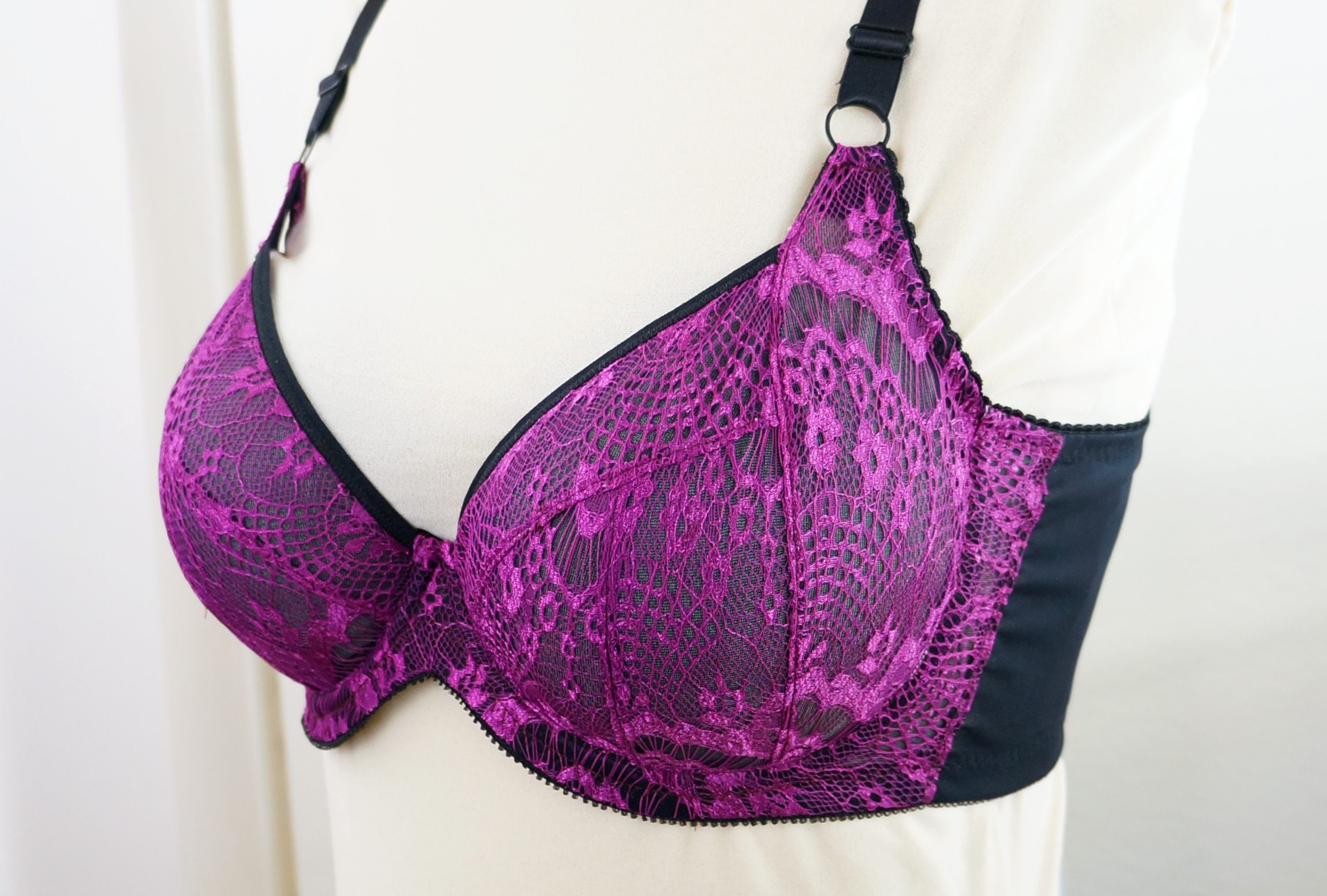  Roughly a 36E with reduced bottom cup height. 