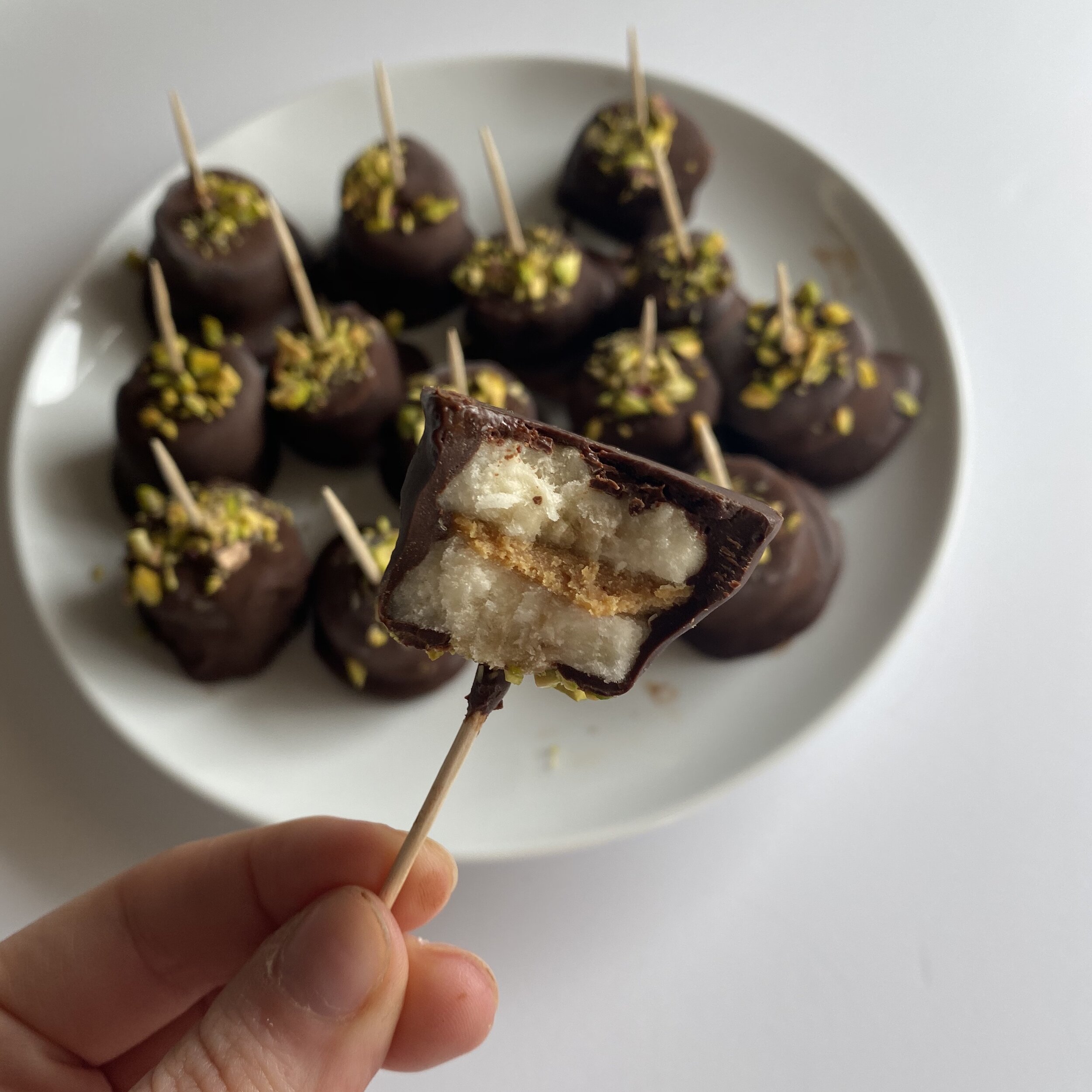Chocolate-Dipped Peanut Butter Banana Bites with Pistachio Sprinkles 