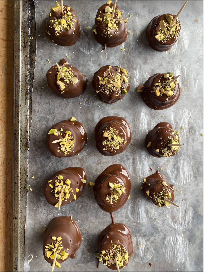 Chocolate-Dipped Peanut Butter Banana Bites with Pistachio Sprinkles 