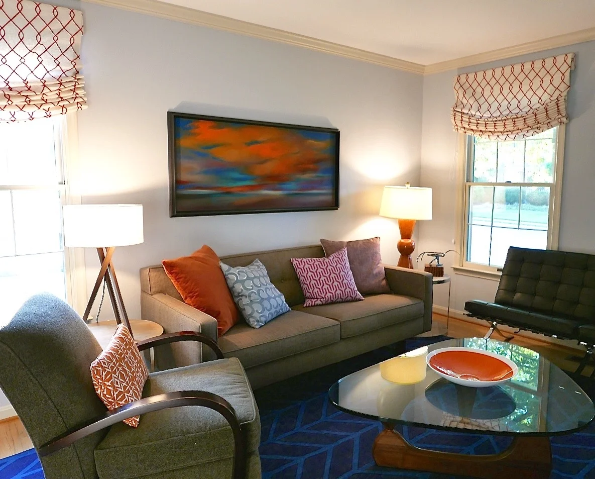 This room was a "one room update", that kept the existing seating, coffee table and painting. The rest is new and included removal of chair rail, paint, rug, roman shades, pillows, side tables and lamps. The changes made the room really pop (the "before" pic can be seen in the "update + refresh" section on homepage). The clear focal point was the art, so I ran with that. This was an affordable and quick refresh, and even though just one room, it changed the feel of the whole house immensely.