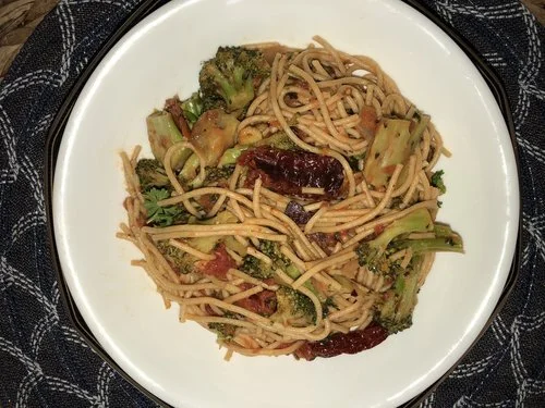 Spaghetti with Broccoli Florets and Fresh Tomatoes