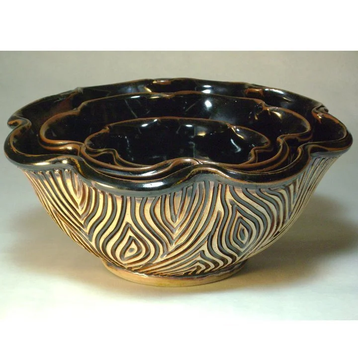 Mill Pond Clay-Works pottery by Jedd Peters specializes in Hand-carved pottery. Each piece is hand thrown and carved one at a time with care. All pots are signed and original, no two are the same. With over 20 years of experience in production pottery Mill Pond Clay-Works provides you with highest quality hand made art. All my pots are Dishwasher and Microwave safe. All my glazes are Lead Free.