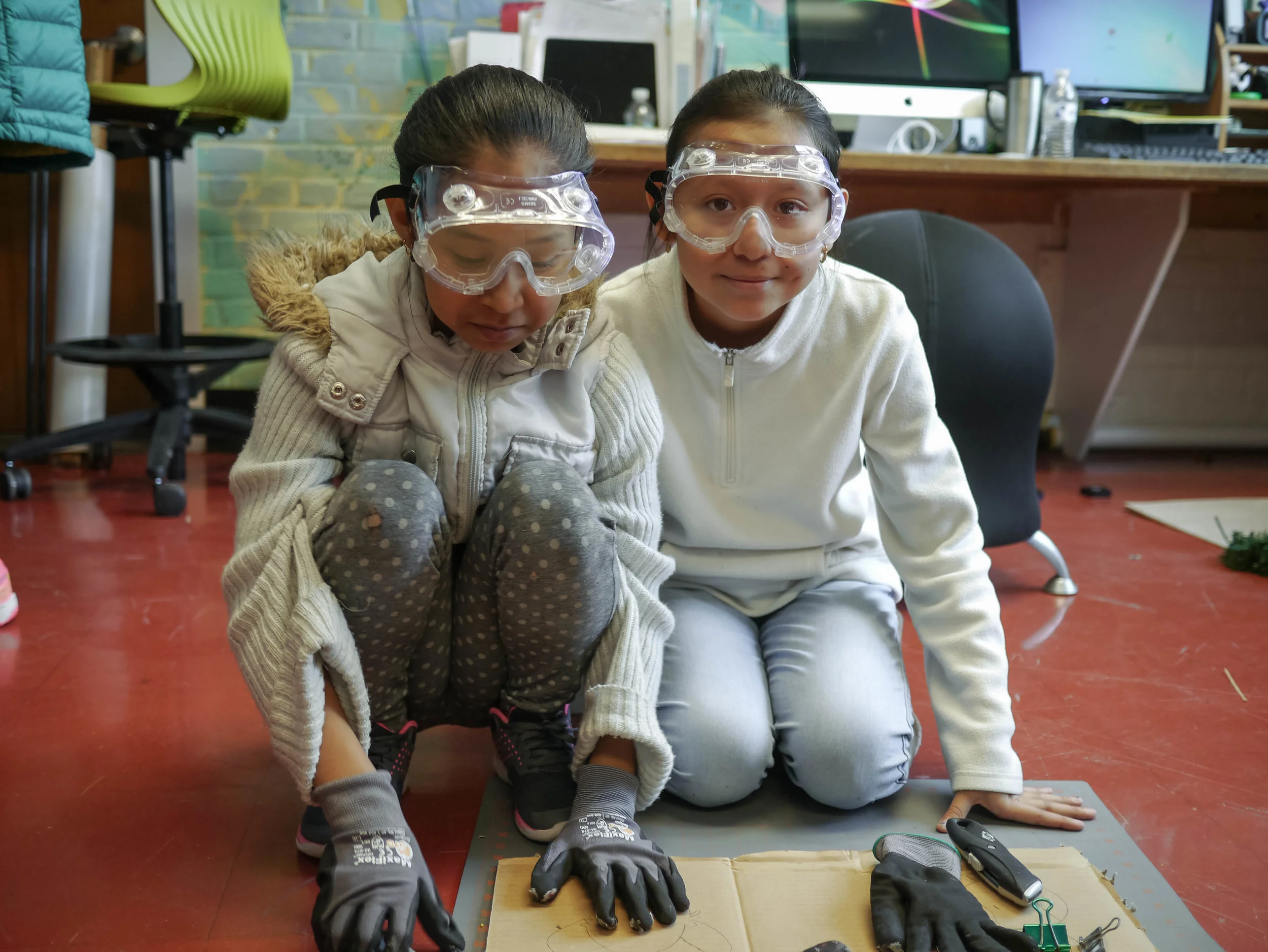 Children work on their projects at the INDE lab.