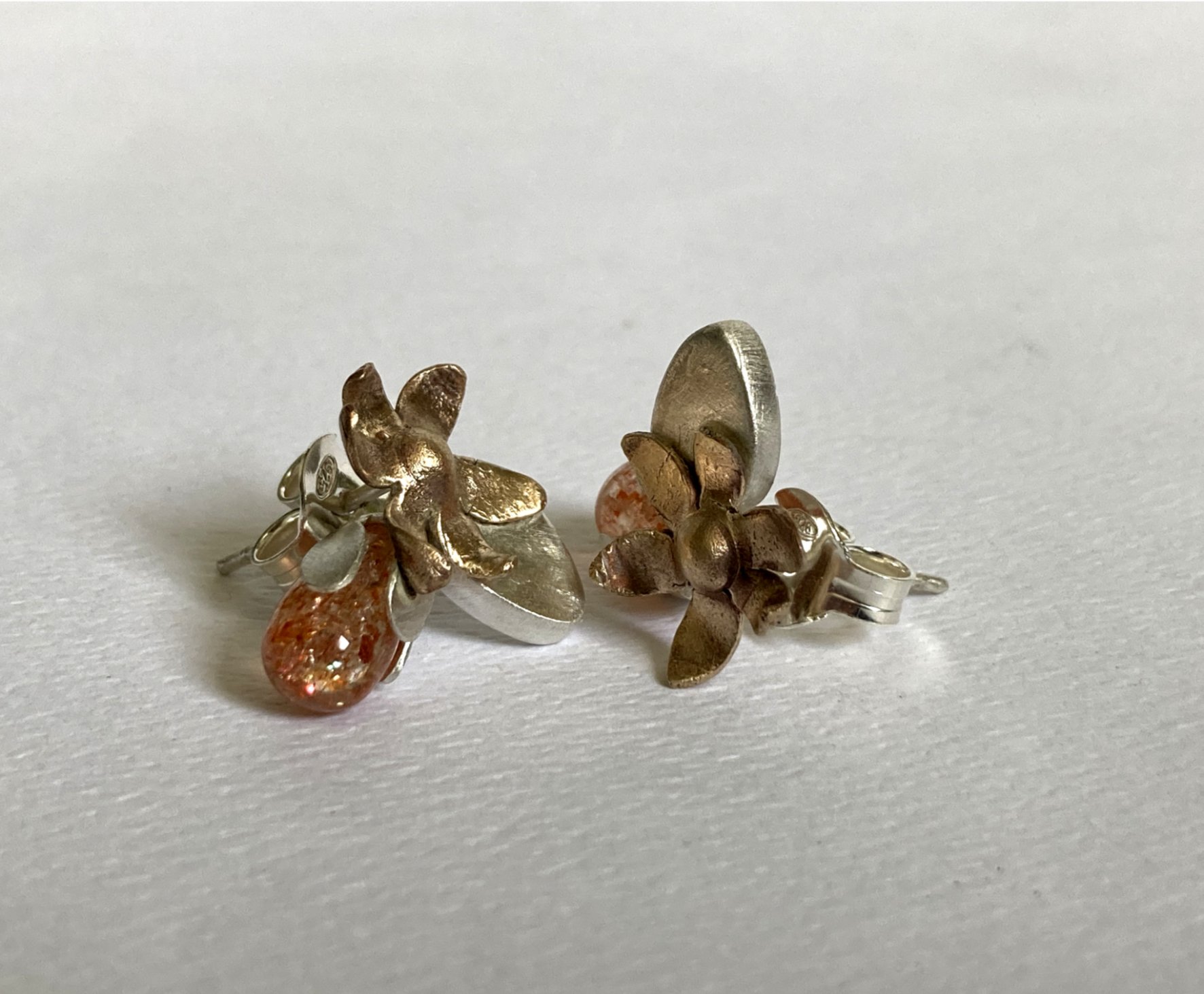 floral studs with sun stone, 3 .jpg