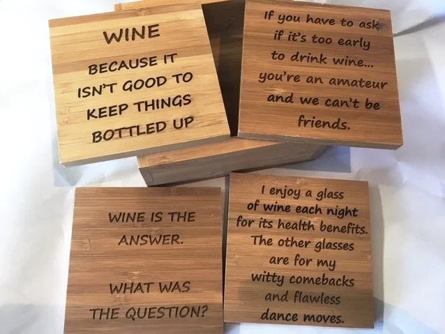 Set of bamboo coasters with funny wine quotes(made by us)... our best seller!