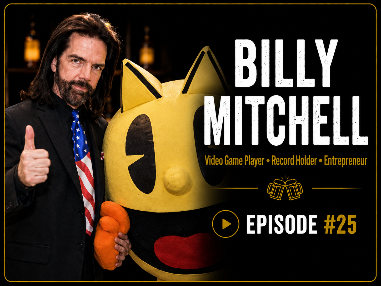A man in a black suit standing next to a large yellow character costume with black ears and big black eyes, giving a thumbs-up gesture. The background is dark with a few blurred bottles visible. The image promotes Billy Mitchell, a video game player, record holder, and entrepreneur, for episode number 25.