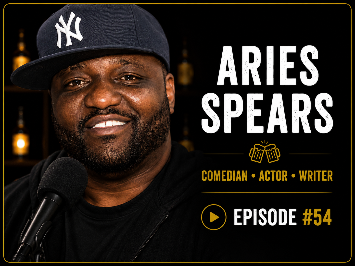 Close-up of Aries Spears, an African American man, wearing a black New York Yankees baseball cap, speaking into a microphone, with blurred bottles behind him. Text overlay announces him as a comedian, actor, and writer, promoting episode 54 of a show or podcast.