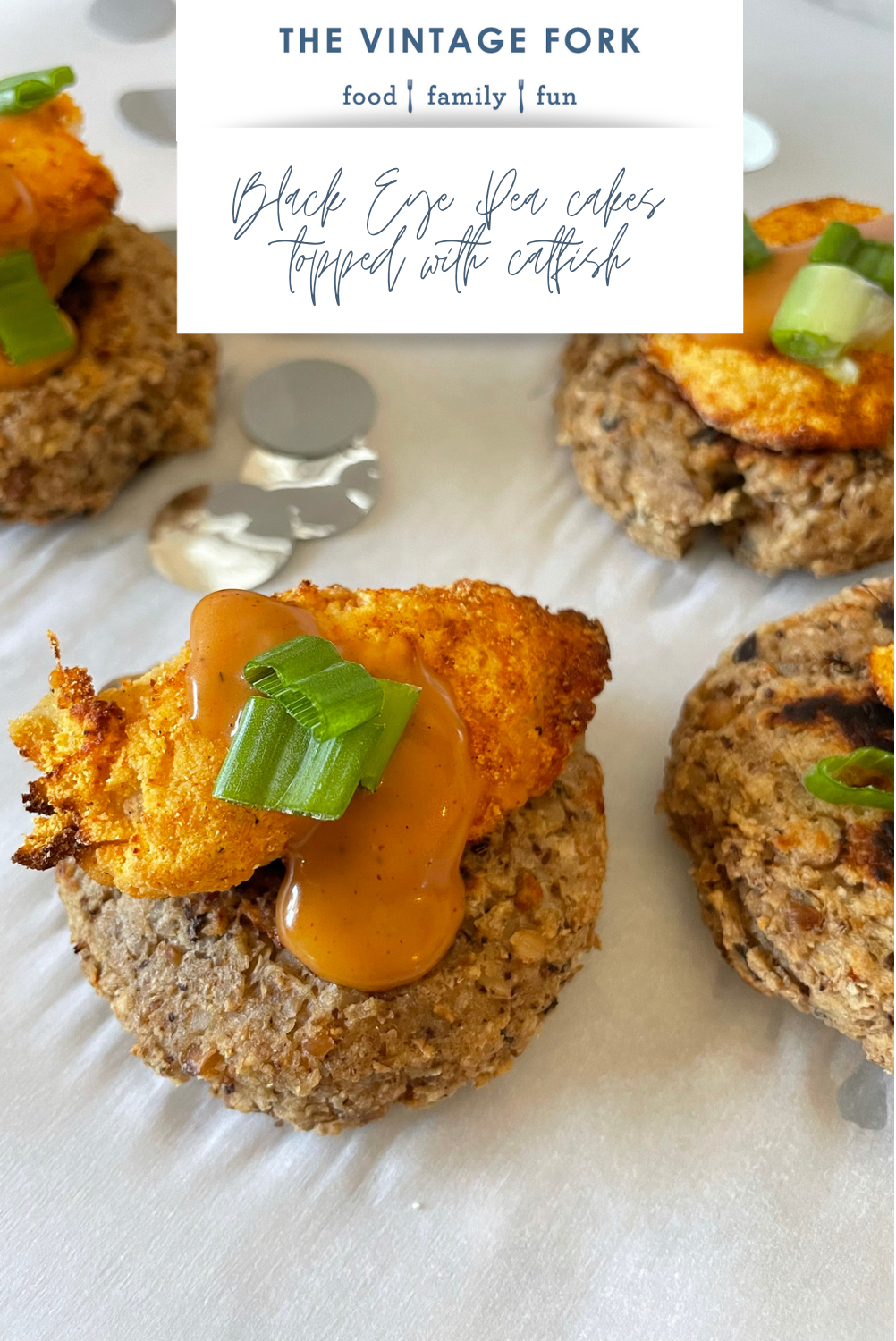 Black Eye Pea Cakes topped with Fried Catfish