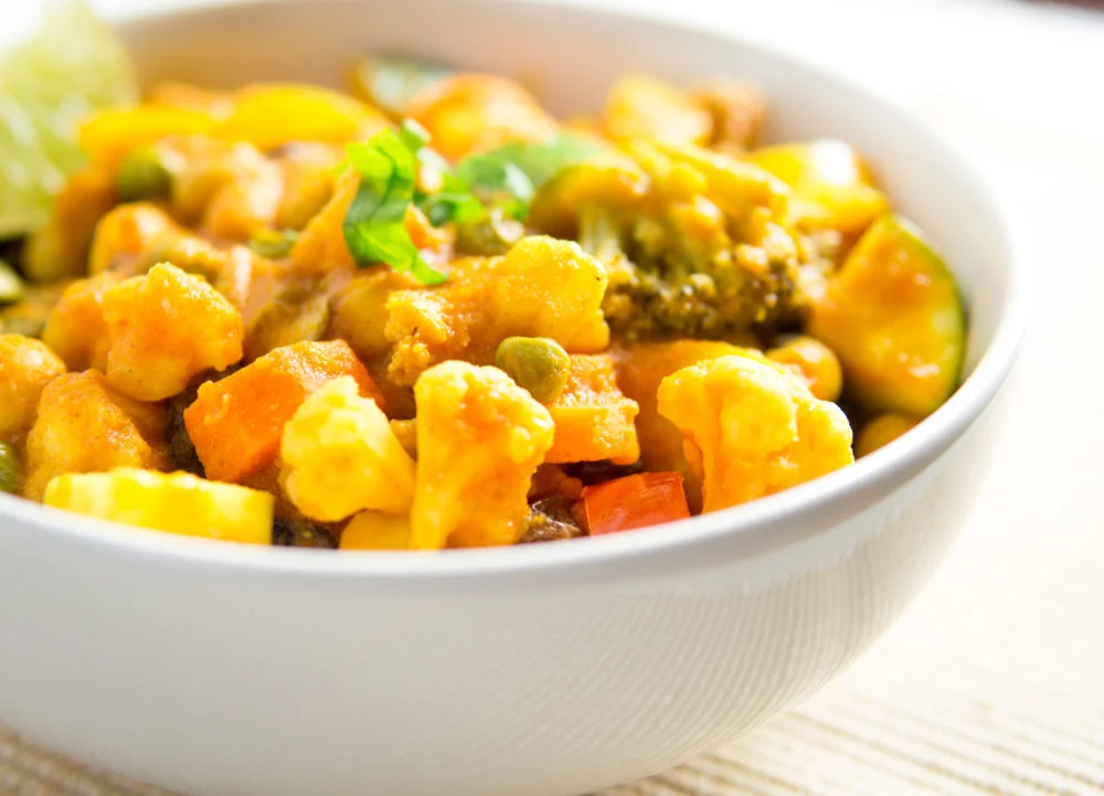 Chickpeas and vegetables in simple tomato curry sauce