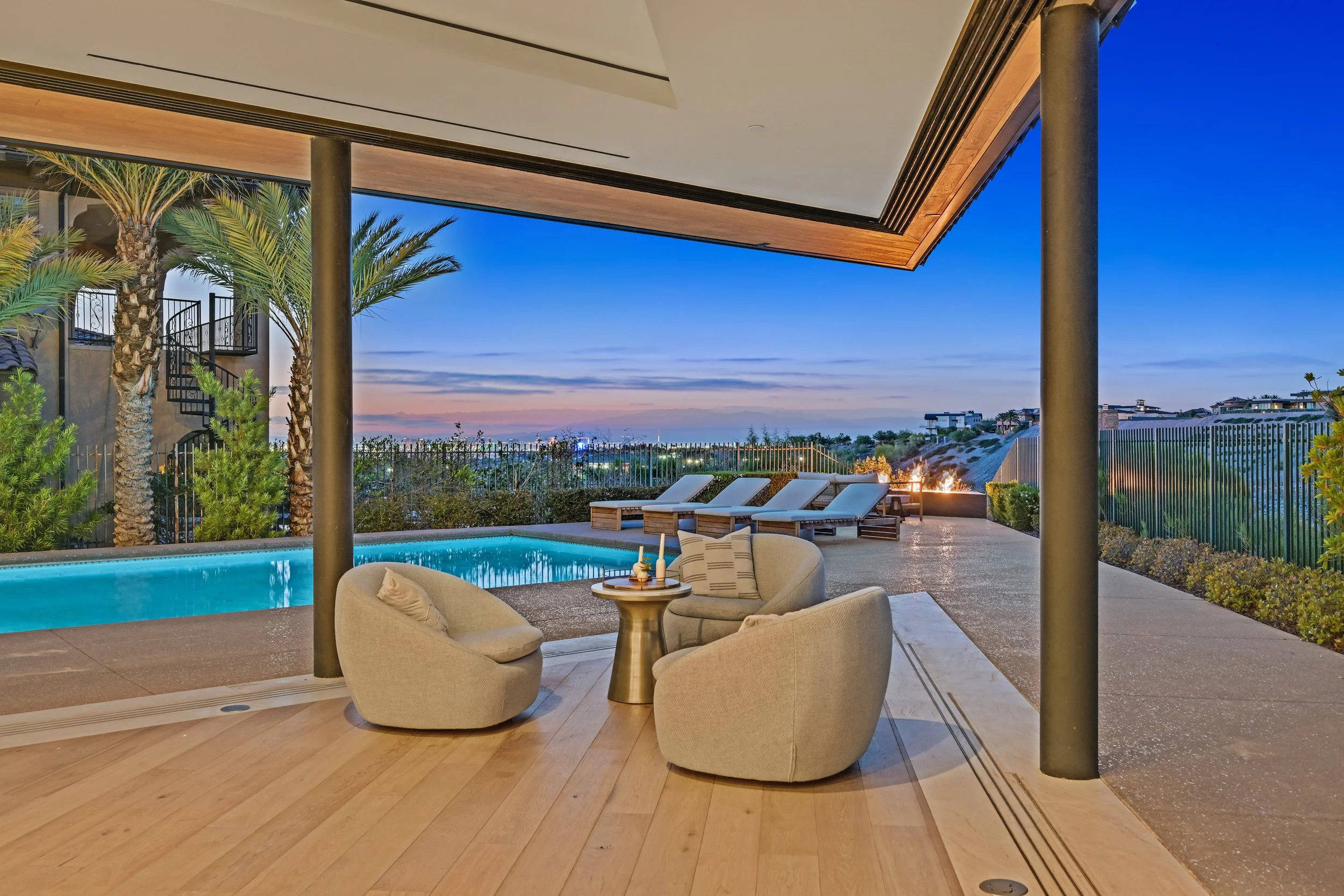 Million-dollar views from Henderson luxury real estate overlooking Las Vegas valley and Strip lights at sunset