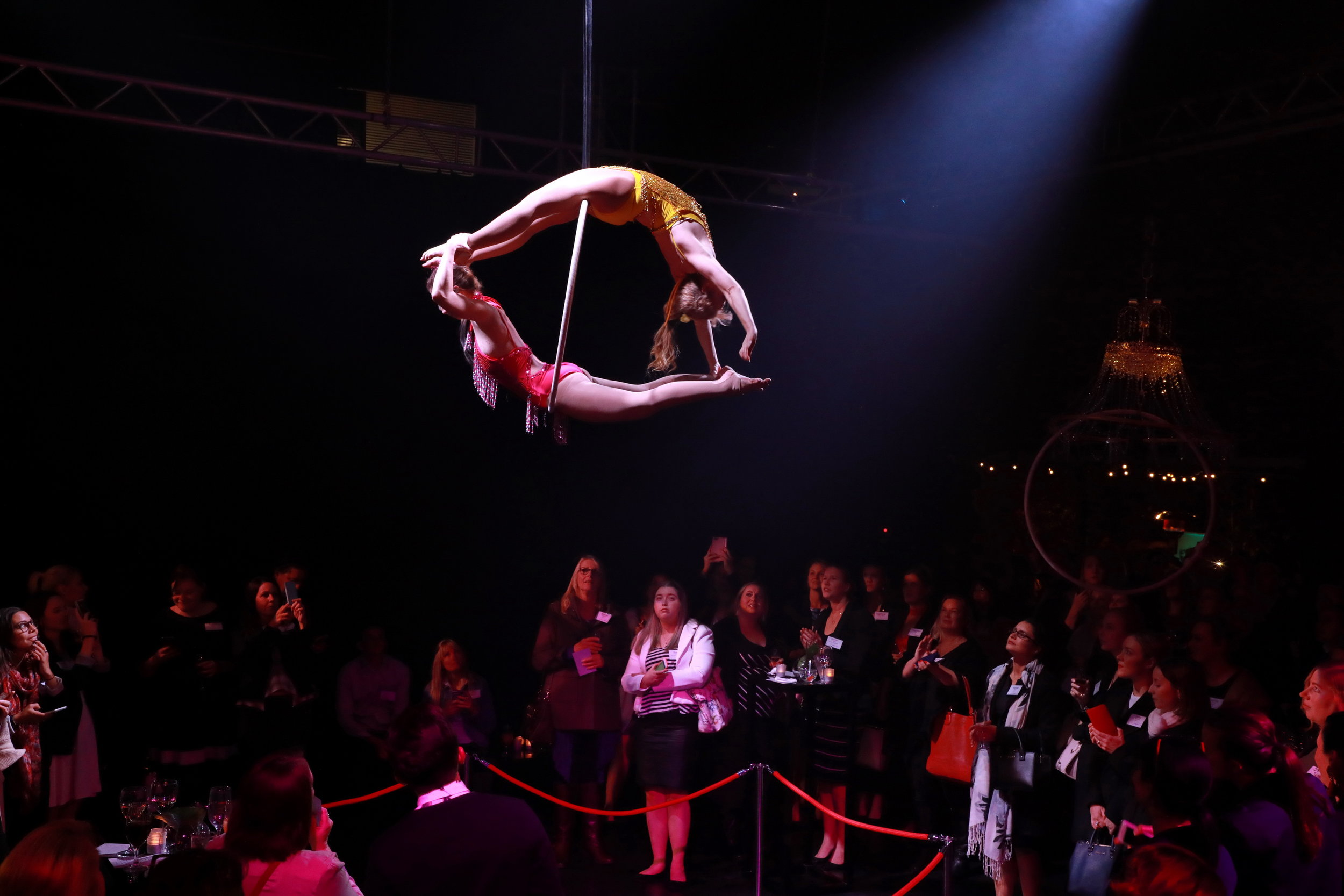 Two aerialists on the same hoop.Maggie Kelley