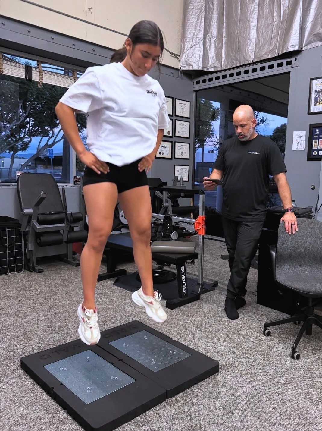 Athlete landing on VALD force plates during return-to-sport testing at Ignite Phyzio