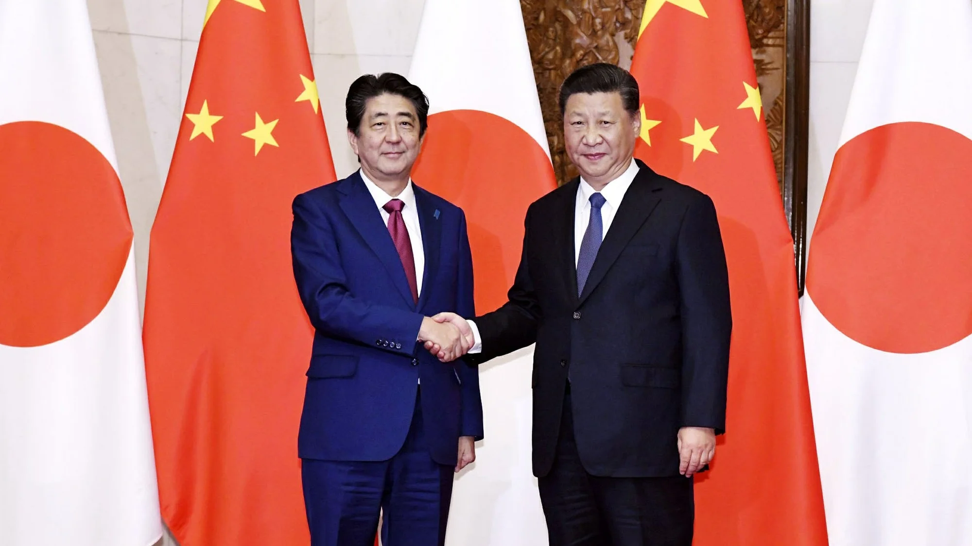 Kyodo News / AP