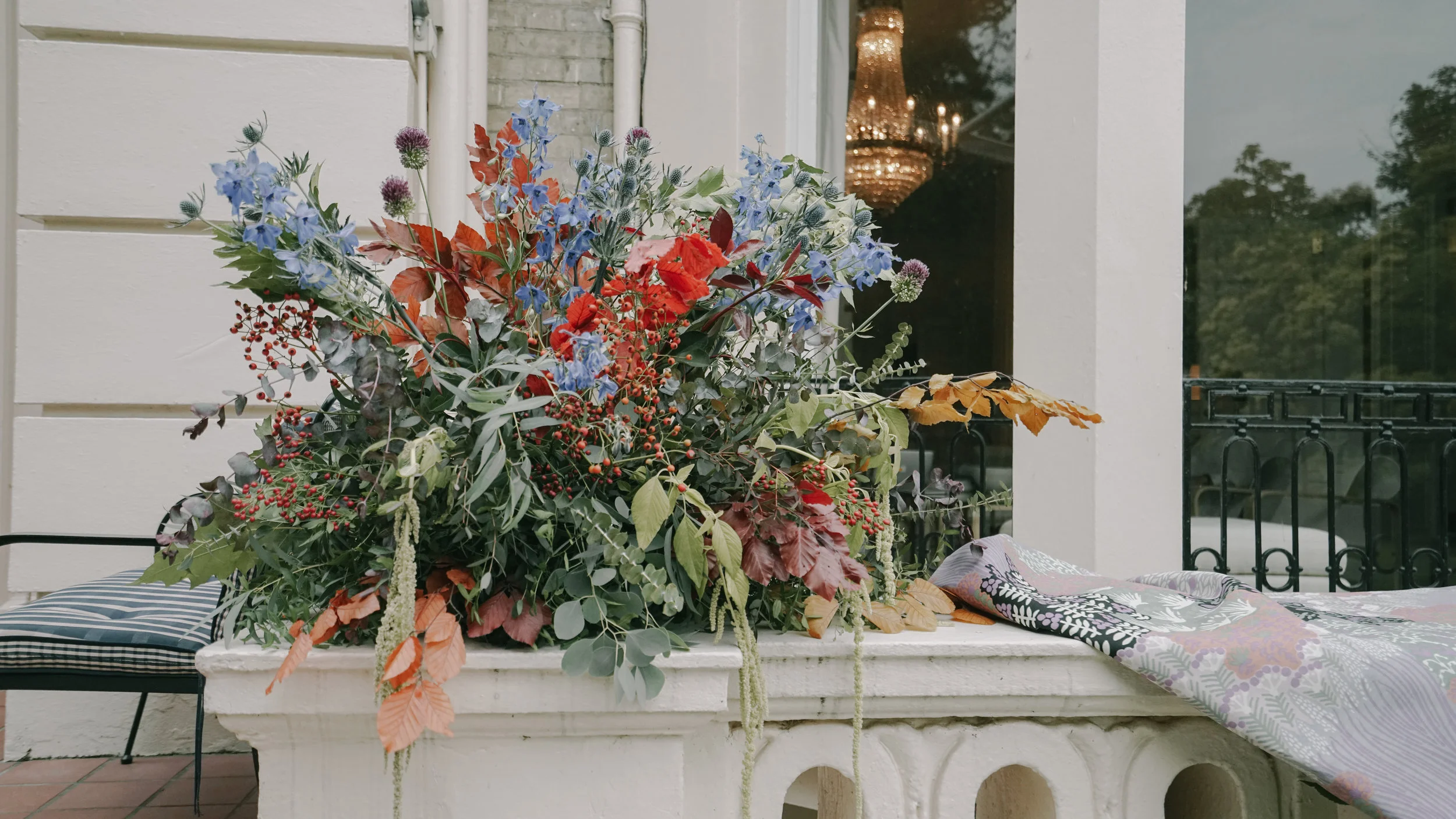 Large autumnal themed foliage based arrangement