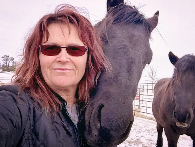 Christine and Caliber (who is trying to steal the shot).