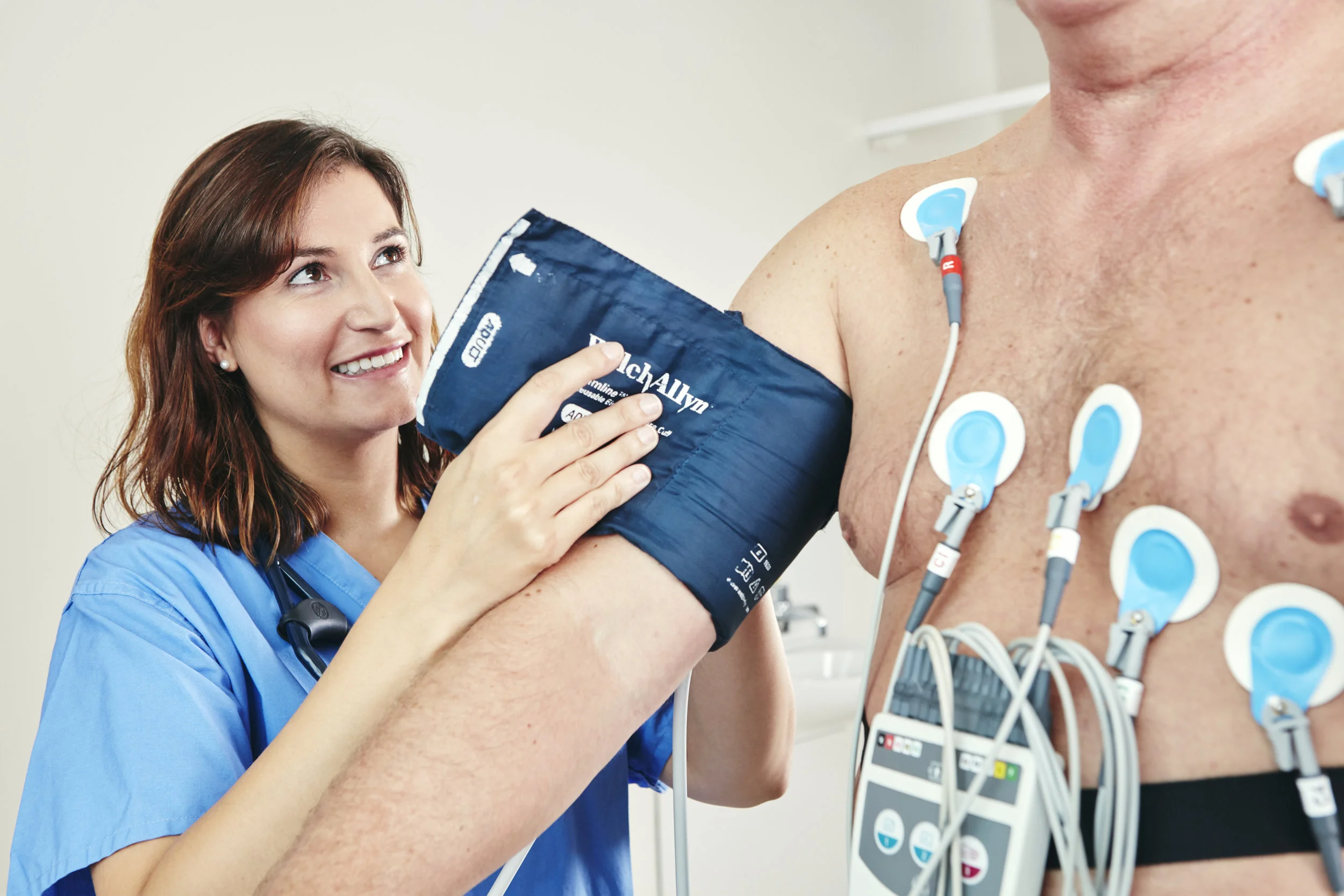 Nurse at Beacon Hospital taking blood pressure of a patient on a treadmill