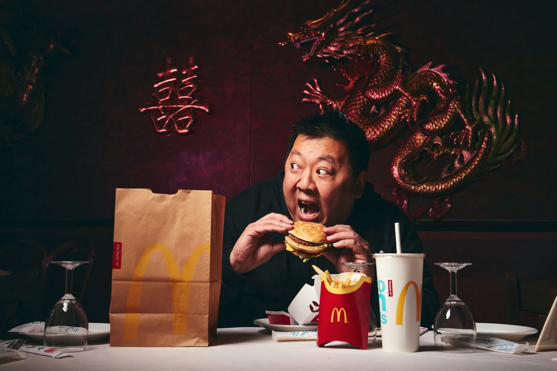 Will Wong Portrait, Chung Ying Restauranteur with his sneaky burger... (Copy)