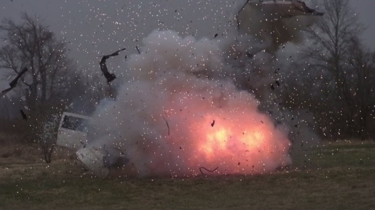 WILL ROGAN’S SLOW MOTION EXPLODING HEARSE, SCREENSHOT FROM VIMEO.COM