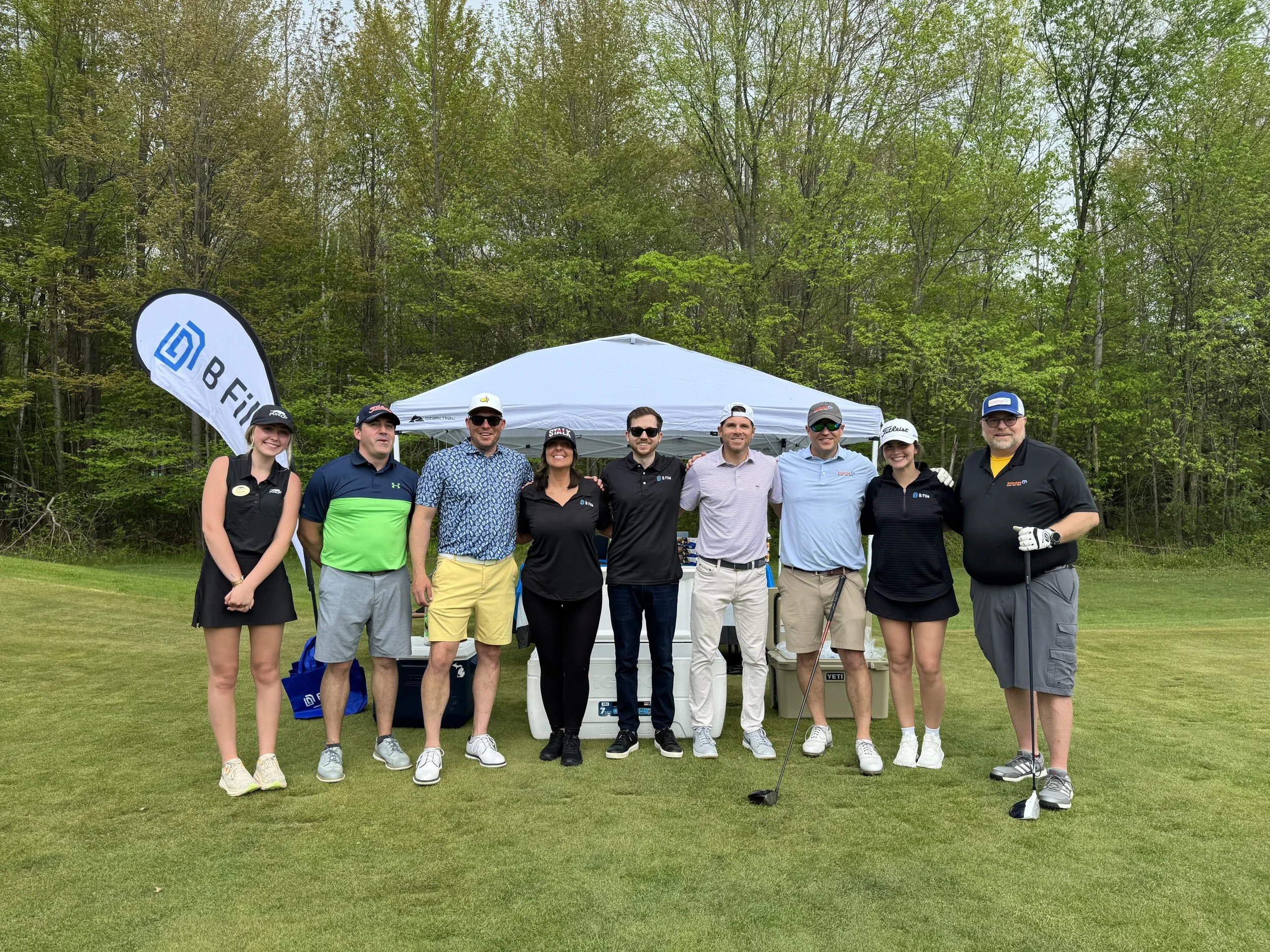 2025 STWD - B File Tent and Golfers.jpg