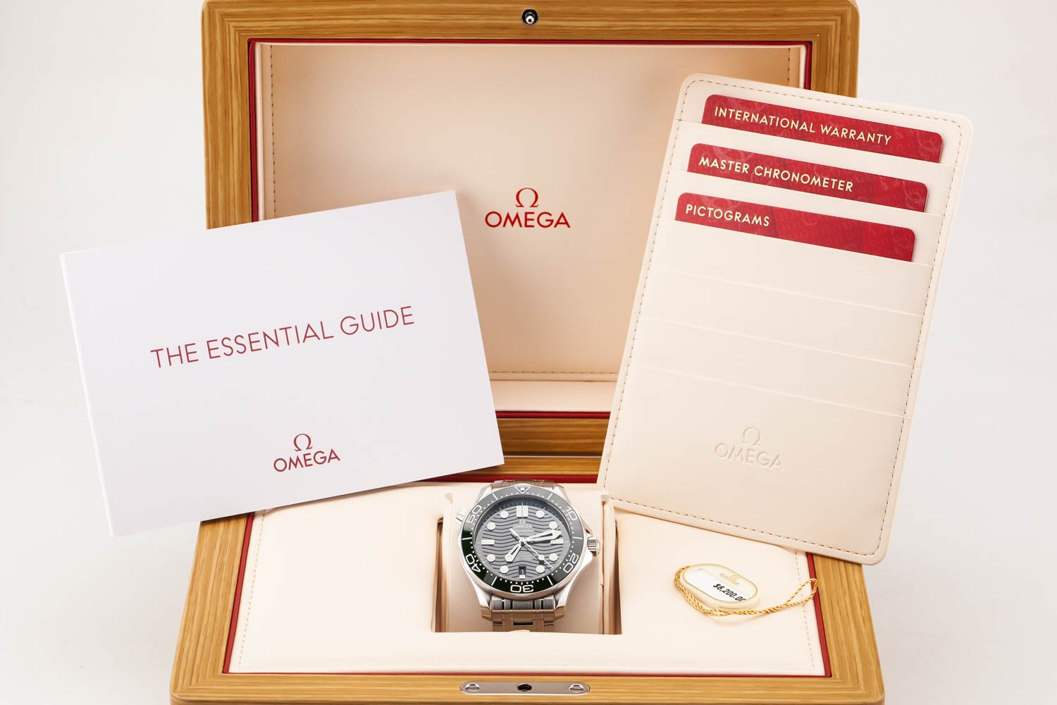 Omega Seamaster 300 Green Wave Bracelet Updated Kit Shot New Booklet 092625 (1 of 1).jpg