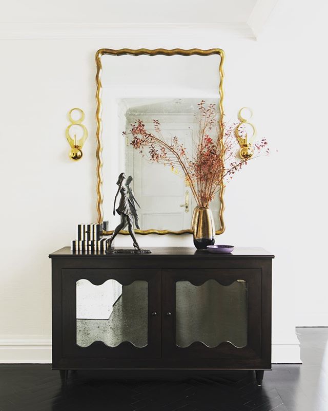 Inspired by my most favorite, Royere, we designed this mirrored cabinet to reflect light into a once dark foyer of a New York apartment. I loved this project and it&rsquo;s transformation. 📷: @laurejoliet -
-
-
-
#caitlinmoraninteriors #beforeandaft