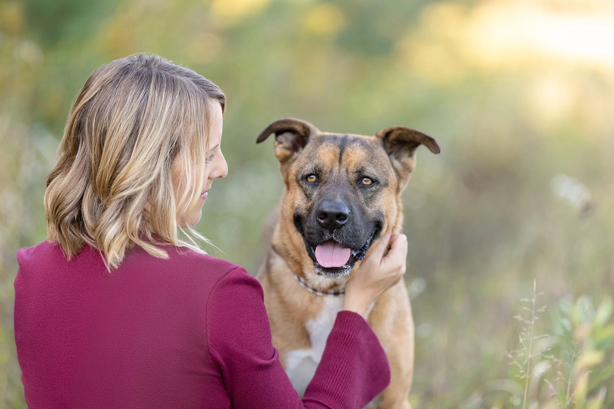 Dog and Owner pose for their photography session in Wisconsin