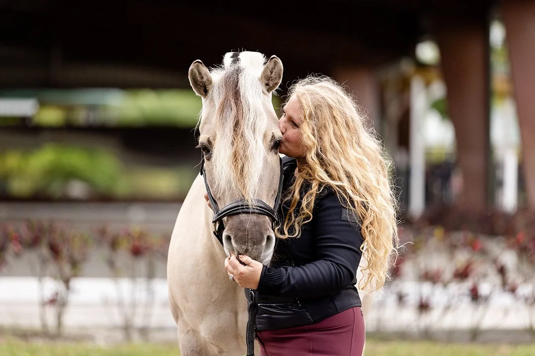 Equestrian portrait of Alexandria Andrasko with Norwegian Fjord dressage mare Corgi Hill Flinka in Wellington Florida