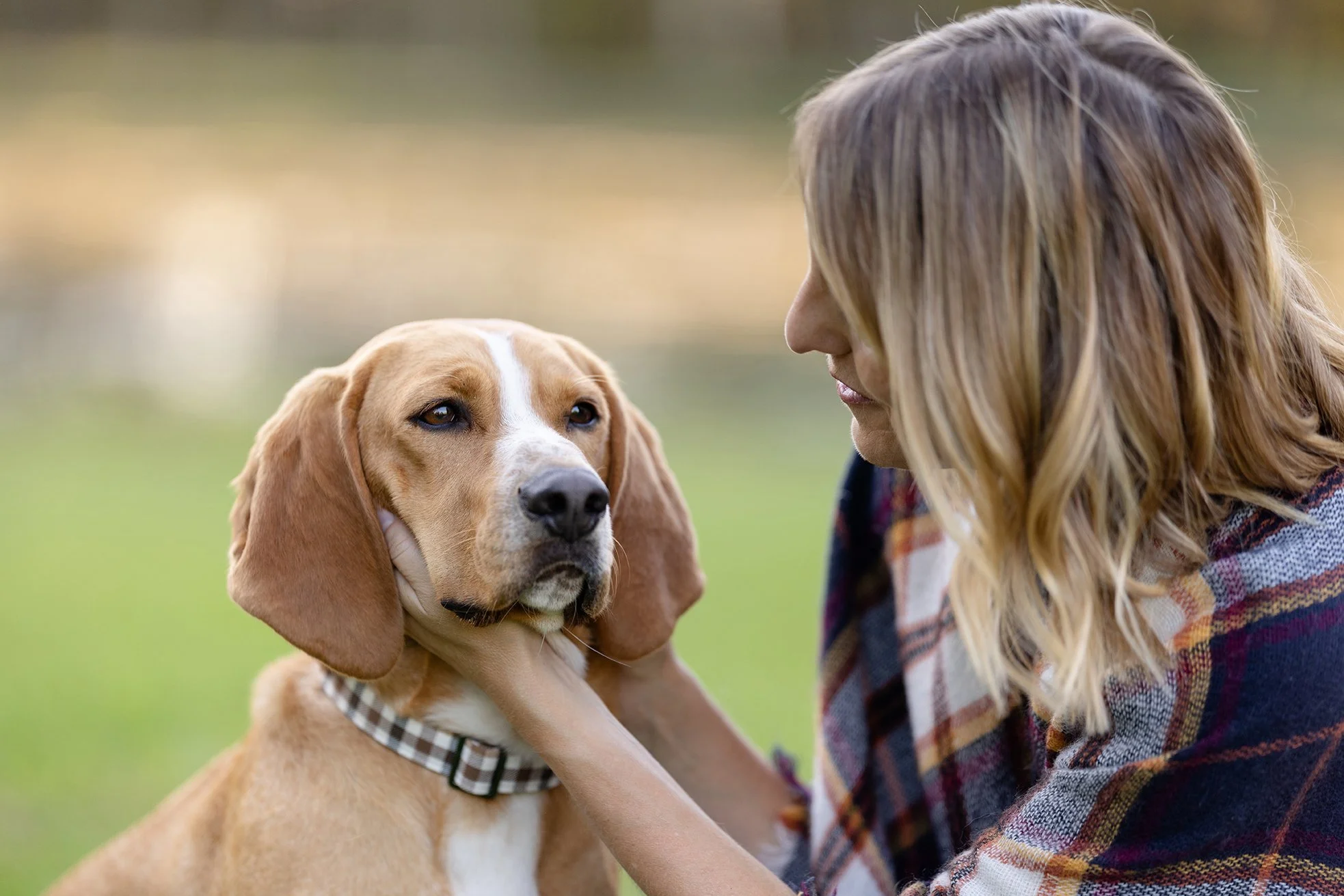 A snuggly dog and owner pose in Wisconsin