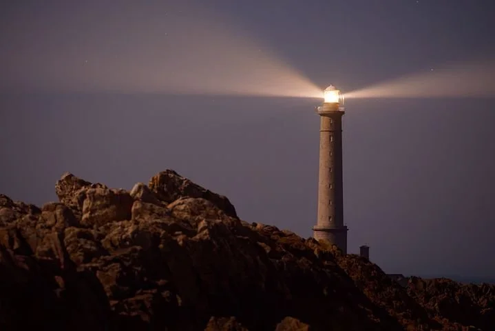 Lighthouse with rocks-2560792__480.jpg