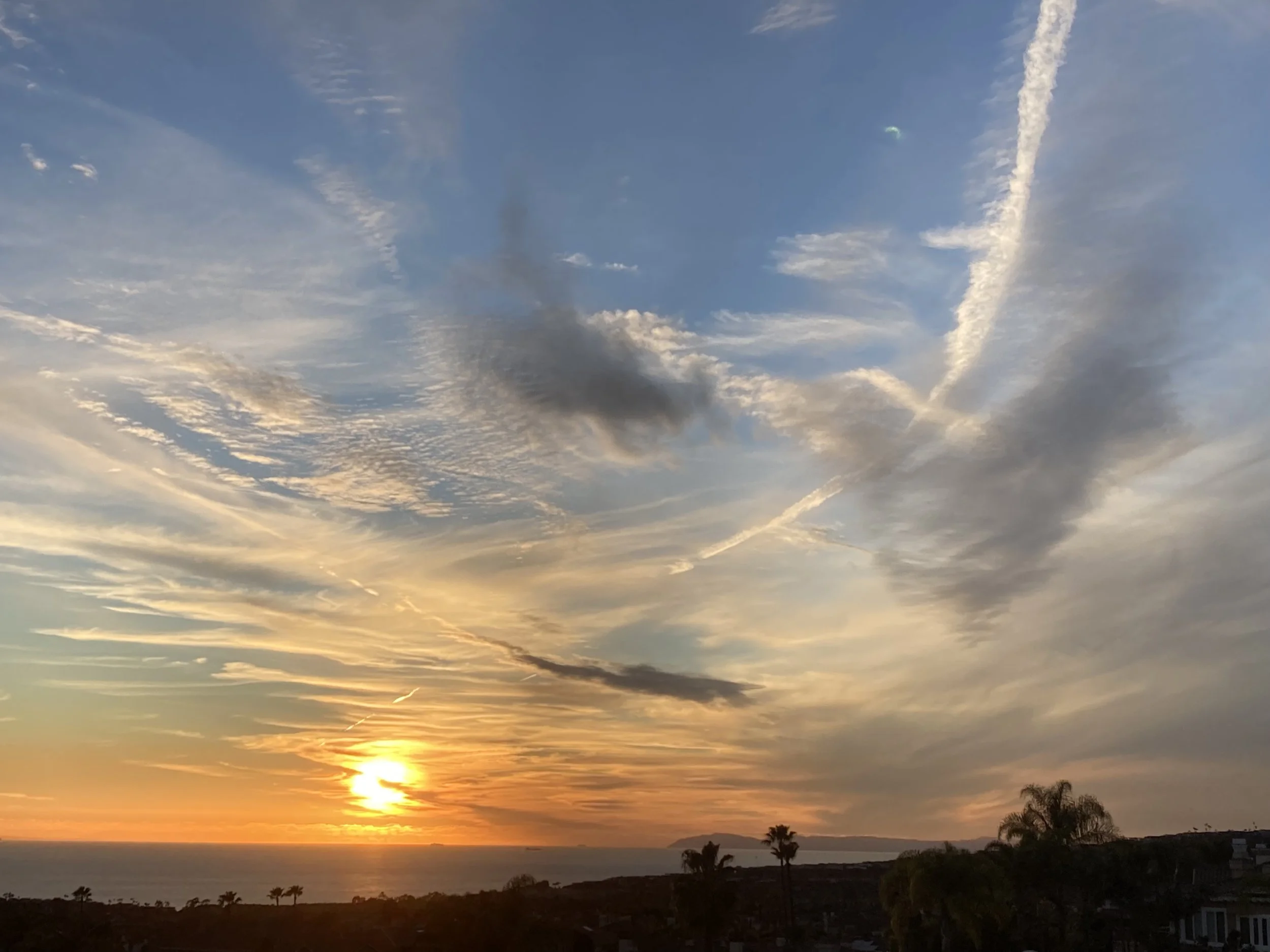 Sunset--Brilliant with Sky Curls.jpeg