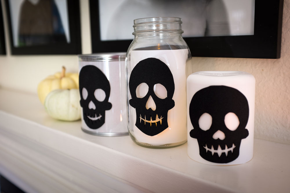 STEP 3: Adhere black skull cutout onto container. Insert tea light. Marvel at your own craftiness.