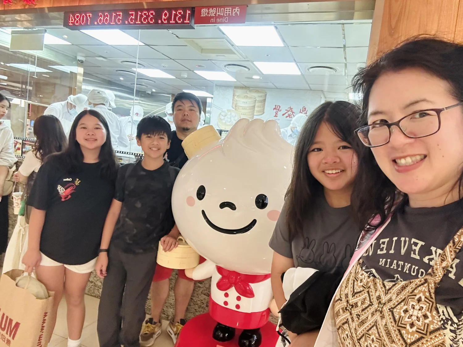 family pic with Din Tai Fung's mascot