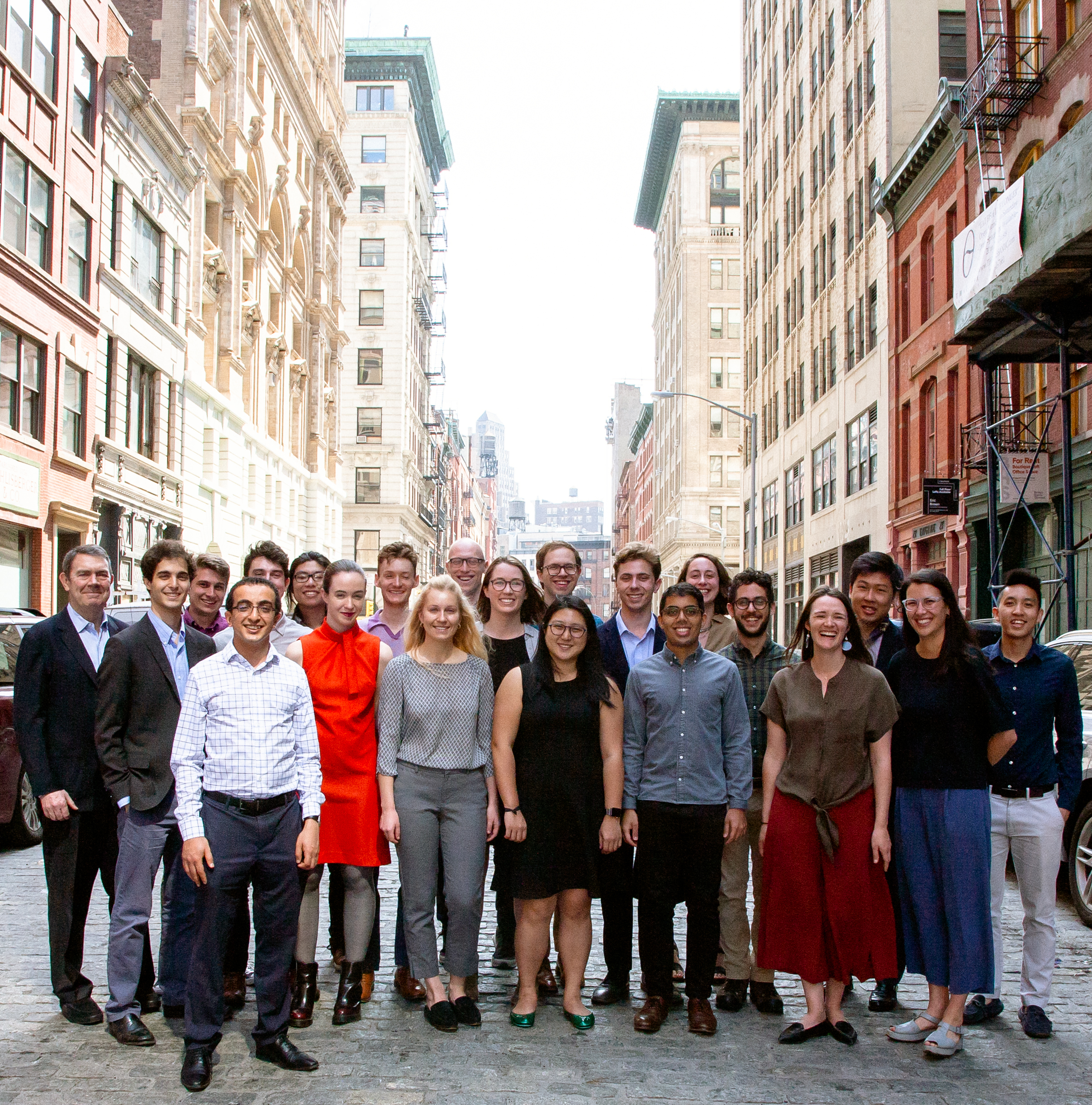Locus employees standing in Manhattan street.