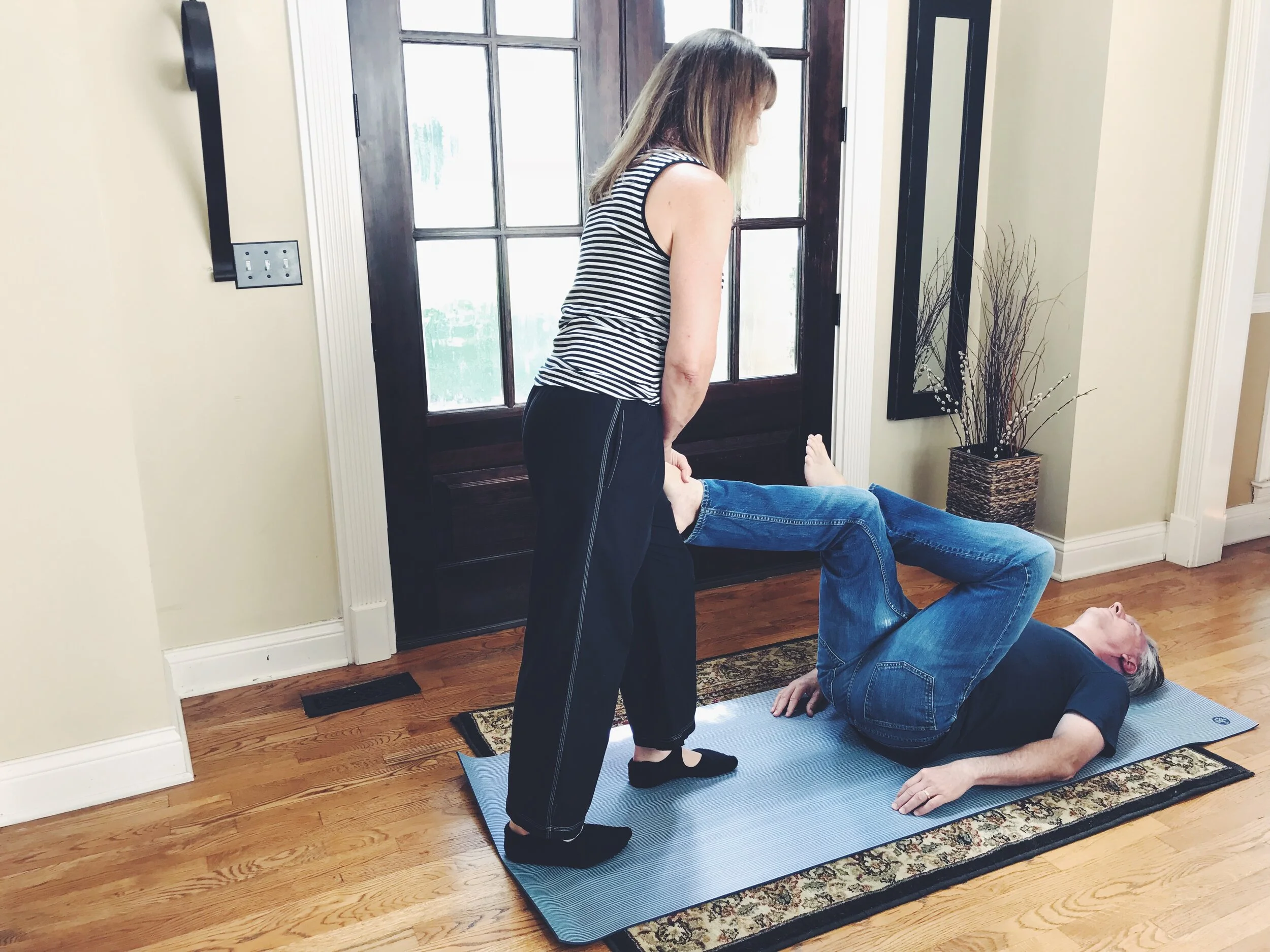 Grab A Partner: Try these 2 Hip Opening & Spine Elongating Partner Stretches