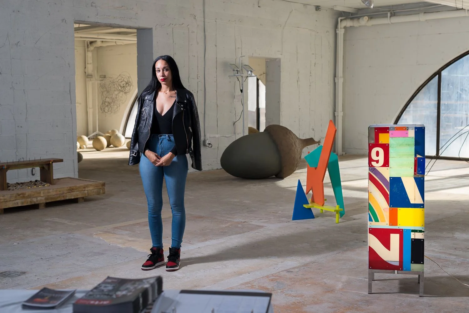Curator and member Tara Fay with her curatorial exhibition, Contemporaneous, in 2017.
