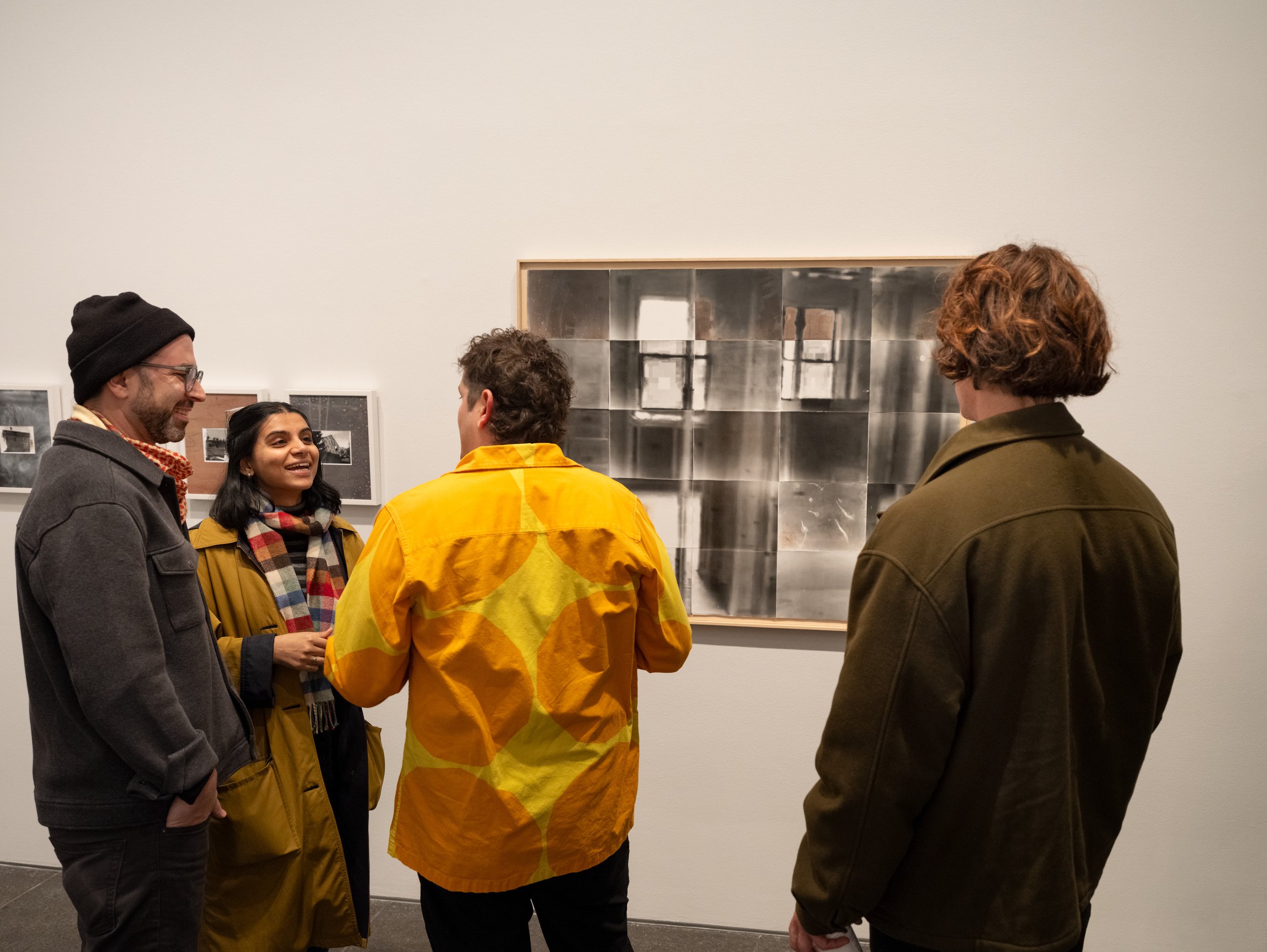 Artist Bryan Martello (center left), at the opening celebration of Forum 89: Nearing Each Other, Carnegie Museum of Art, Pittsburgh, October 17, 2024