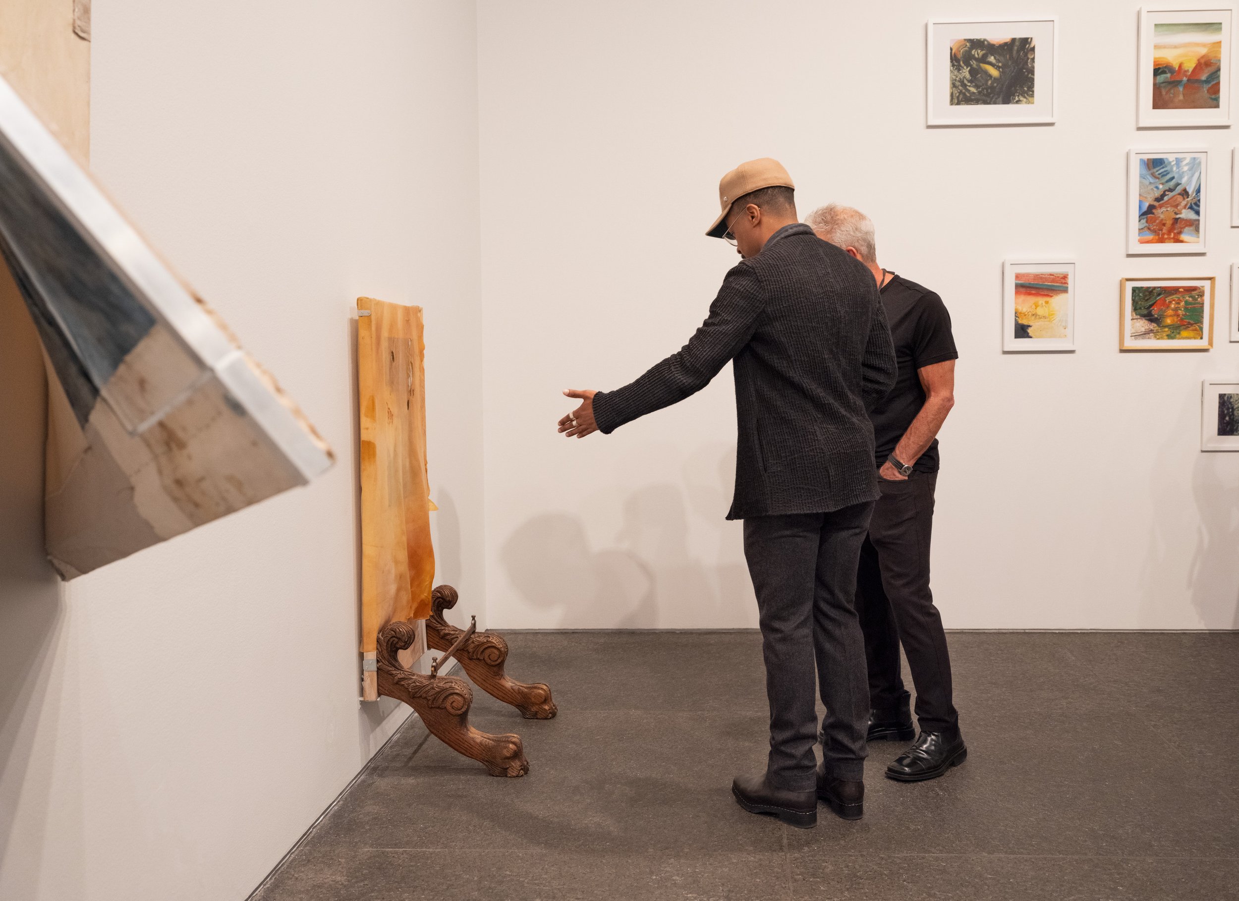 Artist Justin Emmanuel Dumas with his work Iron Gut Anima (2024), during the opening celebration of Forum 89: Nearing Each Other, Carnegie Museum of Art, Pittsburgh, October 17, 2024