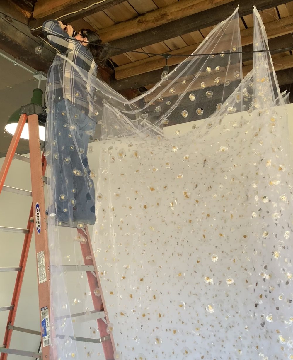 Simmons installing In Your Words at Tissue Farm 2025