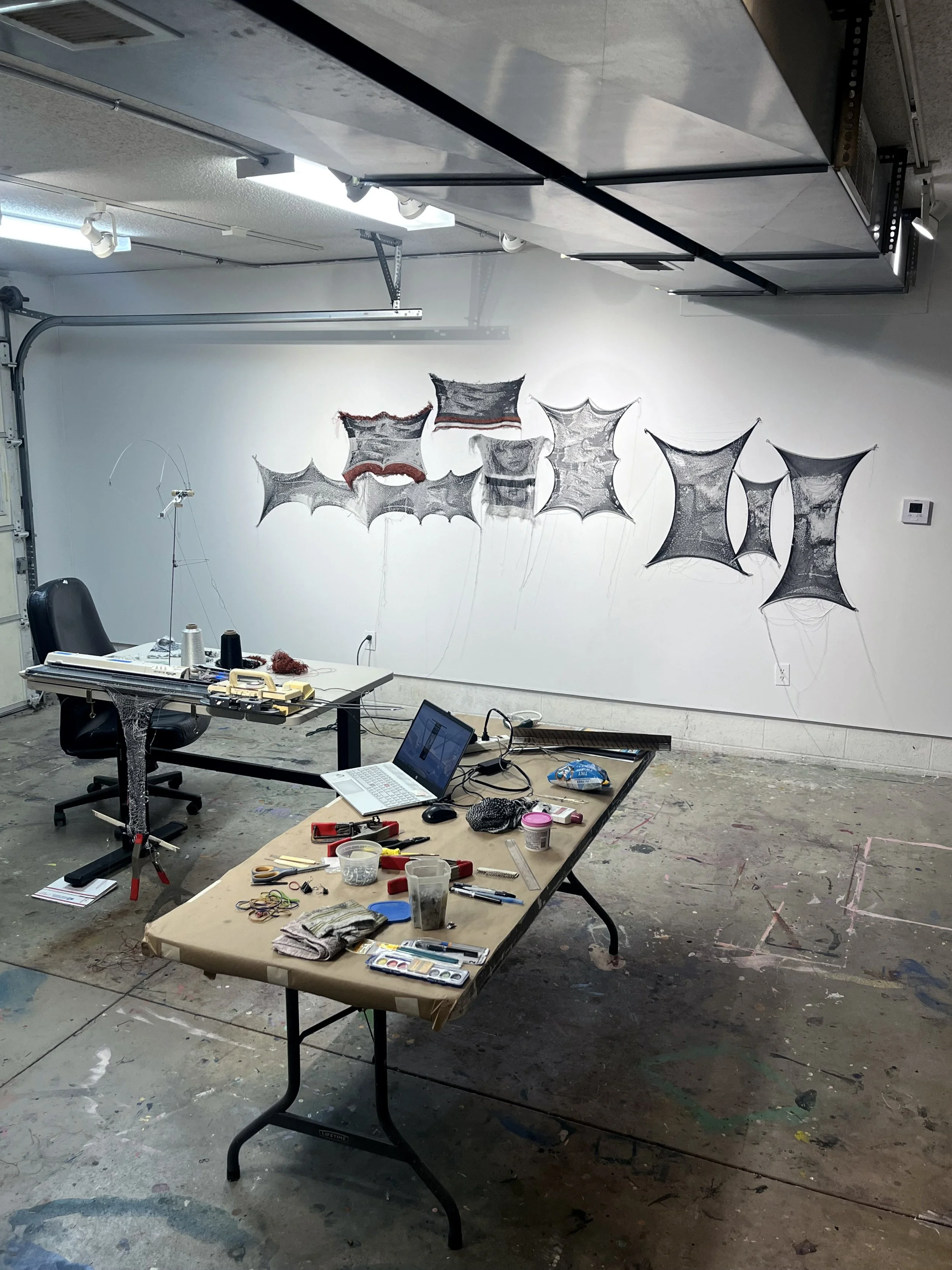 studio shot with knit works in progress, 2023