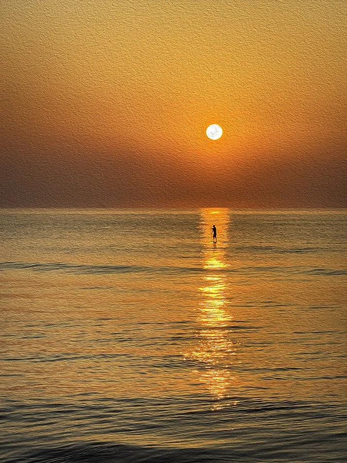 cynkar paddleboarding at dawn.jpg